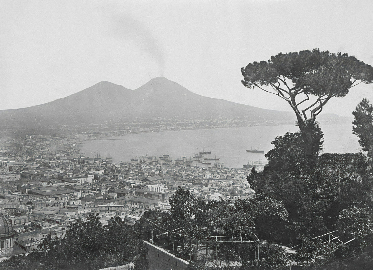 City in the past with mountains, port and ships